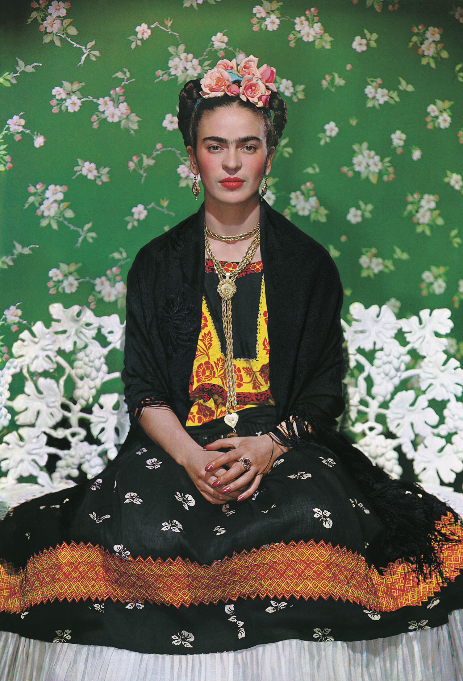 Frida Kahlo on a bench, carbon print, 1938, photo by Nickolas Muray © The Jacques and Natasha Gelman Collection of 20th Century Mexican Art and The Verge,Nickolas Muray Photo Archives